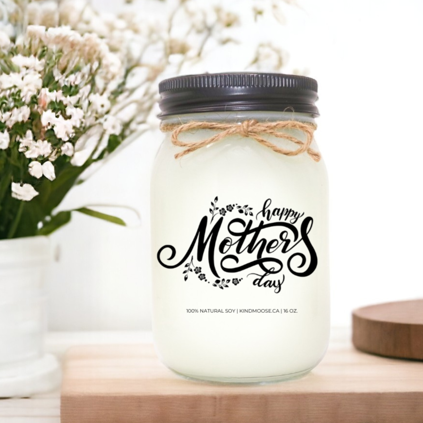 A scented soy candle jar and Black lid with "Happy Mother's Day" printed on it with a rustic twine bow, evoking a warm, heartfelt gift for Mom