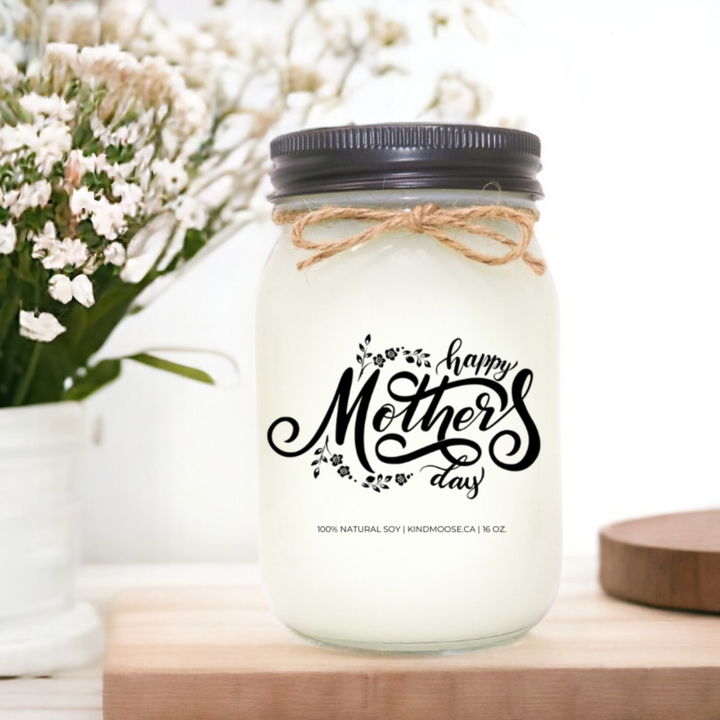 A scented soy candle jar and Black lid with "Happy Mother's Day" printed on it with a rustic twine bow, evoking a warm, heartfelt gift for Mom