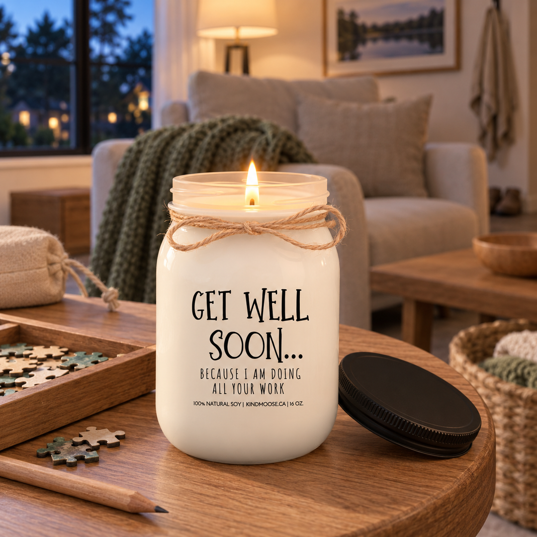 Burning KINDMOOSE Get Well Soon Because I Am Doing All Your Work candle in a cozy family room, capturing a relaxing evening while recovering at home.