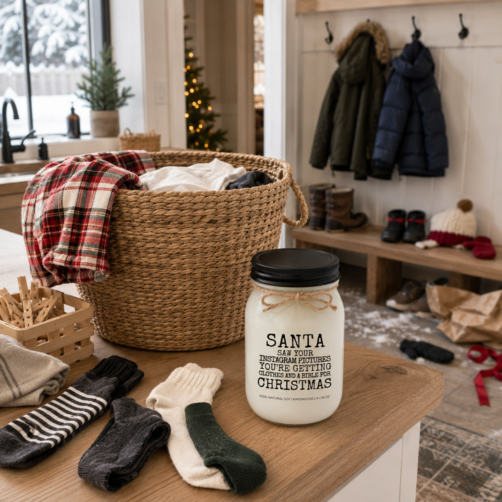 KINDMOOSE Santa Saw Your Instagram Pictures Christmas candle with black lid in a bright farmhouse laundry and mudroom on Boxing Day.